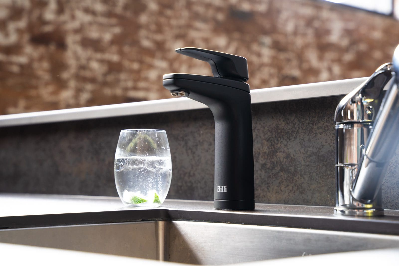 billi tap next to a glass of sparkling water